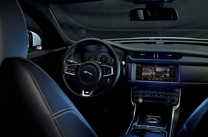 Jaguar XF's steering wheel, dashboard and control centre.